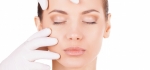 Woman getting examined by surgeon